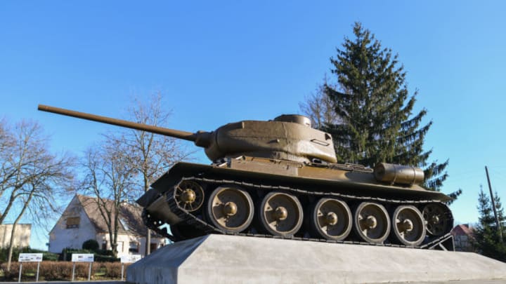 16 January 2020, Brandenburg, Kienitz: The monument of a Russian tank of the type T34 can be seen in Letschin district in the Oderbruch. The tank standing on a pedestal reminds of the first bridgehead of the Red Army on the western bank of the Oder. On 31 January 1945 it crossed the frozen river from Poland. The tank was in service of the GDR People's Army (NVA) until 1970. On the 75th anniversary of the end of the war, a commemoration event is to be held at this place on 31.01.2020. Photo: Patrick Pleul/dpa-Zentralbild/ZB (Photo by Patrick Pleul/picture alliance via Getty Images)