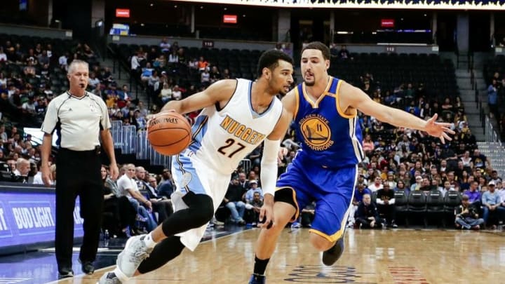Oct 14, 2016; Denver, CO, USA; Golden State Warriors guard Klay Thompson (11) guards Denver Nuggets guard Jamal Murray (27) in the second quarter at the Pepsi Center. Mandatory Credit: Isaiah J. Downing-USA TODAY Sports