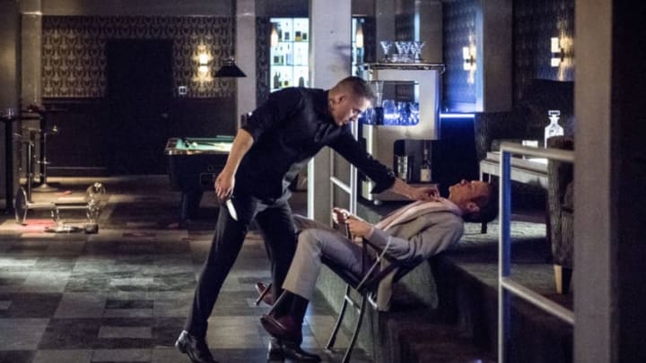 Arrow -- "The Dragon" -- Image Number: AR619a_0260.jpg -- Pictured (L-R): Kirk Acevedo as Ricardo Diaz and Ashton Holmes as Eric Cartier -- Photo: Dean Buscher/The CW -- ÃÂ© 2018 The CW Network, LLC. All rights reserved.