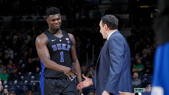 SOUTH BEND, IN - JANUARY 28: Zion Williamson #1 of the Duke Blue Devils is congratulated by head coach Mike Krzyzewski as he comes off the floor during the game against the Notre Dame Fighting Irish at Purcell Pavilion on January 28, 2019 in South Bend, Indiana. Duke won 83-61. (Photo by Joe Robbins/Getty Images)