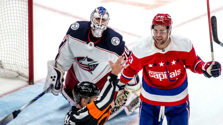 WASHINGTON, DC - DECEMBER 09: Referee Brad Meier (34) issues a two minute penalty to Washington Capitals Right Wing Tom Wilson (43) during a NHL game between the Washington Capitals and the Columbus Blue Jackets on December 09, 2019, at Capital One Arena, in Washington D.C.(Photo by Tony Quinn/Icon Sportswire via Getty Images)