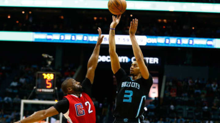Feb 11, 2017; Charlotte, NC, USA; Charlotte Hornets guard Jeremy Lamb (3) shoots the ball over LA Clippers guard Raymond Felton (2) in the second half at Spectrum Center. The Clippers defeated the Hornets 107-102. Mandatory Credit: Jeremy Brevard-USA TODAY Sports