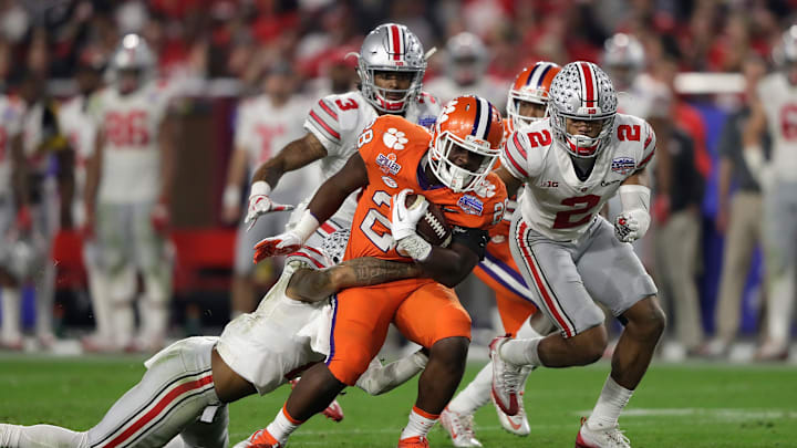 GLENDALE, AZ – DECEMBER 31: Tavien Feaster #28 of the Clemson Tigers runs with the ball against the Ohio State Buckeyes during the 2016 PlayStation Fiesta Bowl at University of Phoenix Stadium on December 31, 2016 in Glendale, Arizona. (Photo by Jamie Squire/Getty Images)