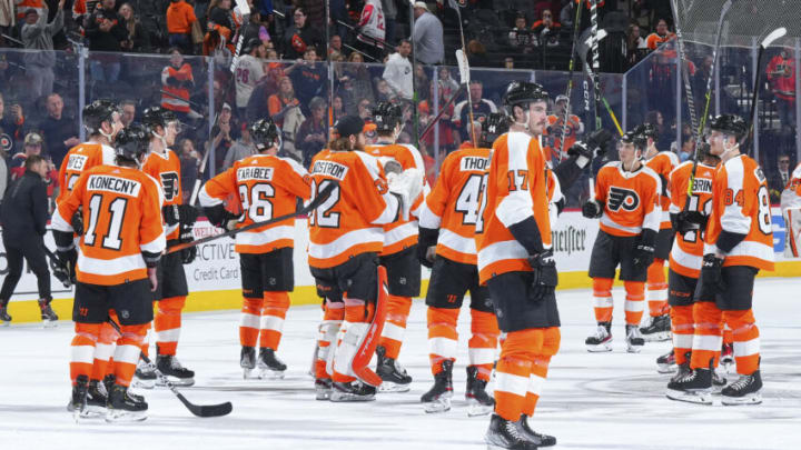 PHILADELPHIA, PA - APRIL 29: The Philadelphia Flyers salute the crowd against the Ottawa Senators at the Wells Fargo Center on April 29, 2022 in Philadelphia, Pennsylvania. (Photo by Mitchell Leff/Getty Images)