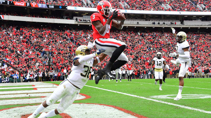 ATHENS, GA – NOVEMBER 24: Jeremiah Holloman #9 of the Georgia Bulldogs (Photo by Scott Cunningham/Getty Images)