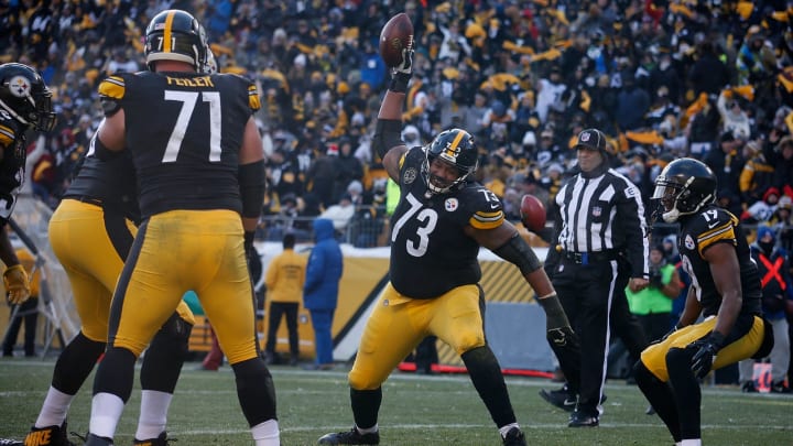 PITTSBURGH, PA - DECEMBER 31: Ramon Foster #73 of the Pittsburgh Steelers spikes the ball after a touchdown by Stevan Ridley #38 in the second quarter during the game against the Cleveland Browns at Heinz Field on December 31, 2017 in Pittsburgh, Pennsylvania. (Photo by Justin K. Aller/Getty Images)