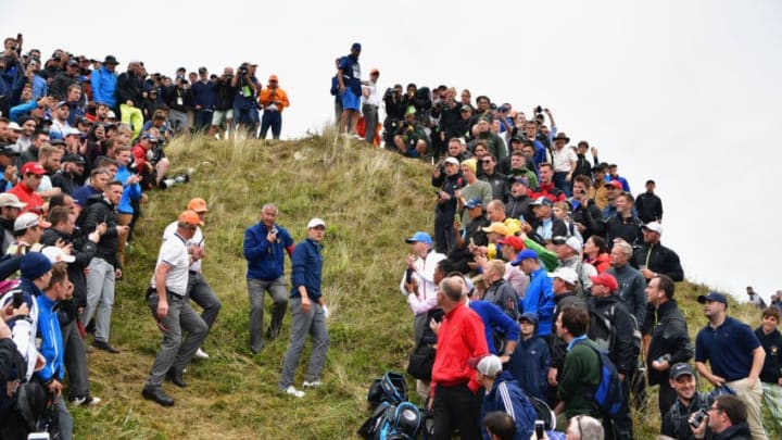 SOUTHPORT, ENGLAND - JULY 23: Jordan Spieth of the United States considers his options with Rules Officials on the 13th hole during the final round of the 146th Open Championship at Royal Birkdale on July 23, 2017 in Southport, England. (Photo by Stuart Franklin/Getty Images)