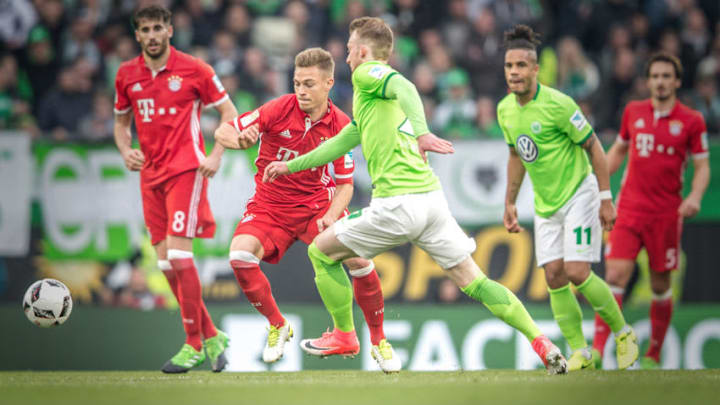 WOLFSBURG, GERMANY - APRIL 29: Maximilian Arnold of Wolfsburg and Joshua Kimmich of Munich during the Bundesliga match between VfL Wolfsburg and Bayern Muenchen at Volkswagen Arena on April 29, 2017 in Wolfsburg, Germany. (Photo by Joern Pollex/Bundesliga/DFL via Getty Images )