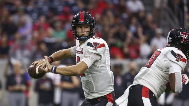 Sep 4, 2021; Houston, Texas, USA; Texas Tech Red Raiders quarterback Tyler Shough (12) attempts a pass during the first quarter against the Houston Cougars at NRG Stadium. Mandatory Credit: Troy Taormina-USA TODAY Sports