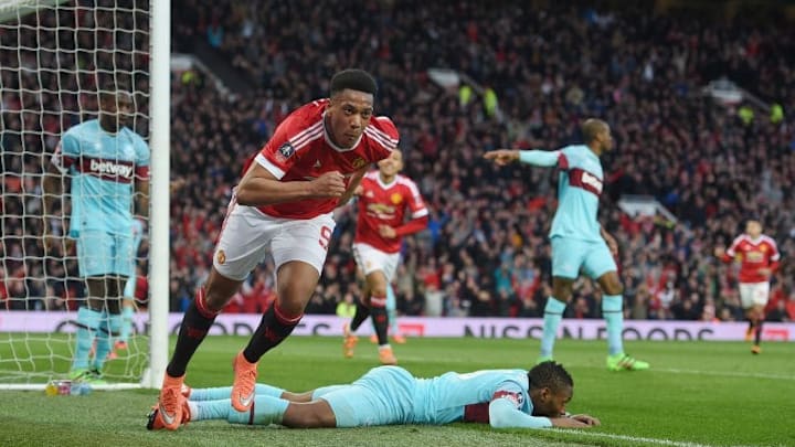 MANCHESTER, ENGLAND - MARCH 13: Anthony Martial of Manchester United celebrates as he scores their first and equalising goal during the Emirates FA Cup sixth round match between Manchester United and West Ham United at Old Trafford on March 13, 2016 in Manchester, England. (Photo by Michael Regan/Getty Images)