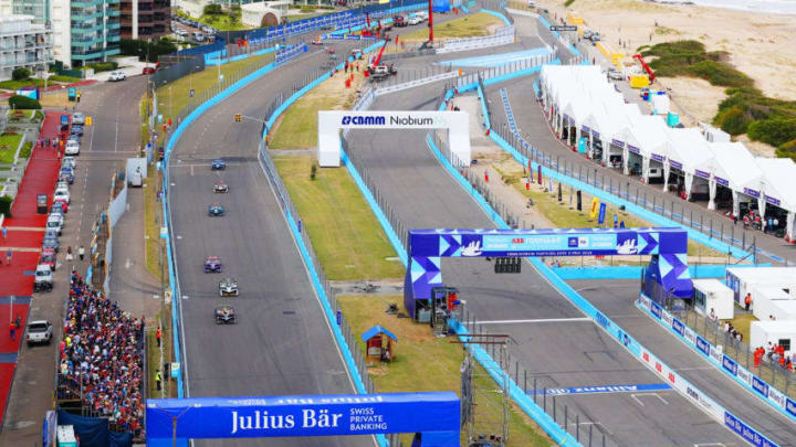 PUNTA DEL ESTE, URUGUAY - MARCH 17: In this handout provided by FIA Formula E, Jean-Eric Vergne (FRA), TECHEETAH, Renault ZE 17, leadsLucas Di Grassi (BRA), Audi Sport ABT Schaeffler, Audi e-tron FE04, and Sam Bird (GBR), DS Virgin Racing, DS Virgin DSV-03 during the Punta del Este ePrix, Round 6 of the 2017/18 FIA Formula E Series on March 17, 2018 at Playa Brava Beach in Punta del Este, Uruguay. (Photo by Sam Bloxham/FIA Formula E via Getty Images)