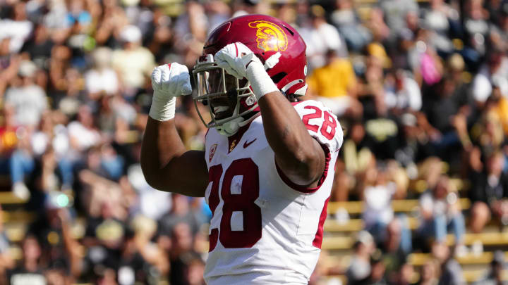 Oct 2, 2021; Boulder, Colorado, USA; USC Trojans running back Keaontay Ingram (28) reacts in the second half against the Colorado Buffaloes at Folsom Field. Mandatory Credit: Ron Chenoy-USA TODAY Sports