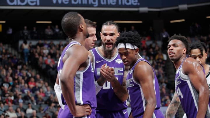 SACRAMENTO, CA - MARCH 19: Harrison Barnes #40, Nemanja Bjelica #88, Willie Cauley-Stein #00, De'Aaron Fox #5 and Buddy Hield #24 of the Sacramento Kings huddle during the game against the Brooklyn Nets on March 19, 2019 at Golden 1 Center in Sacramento, California. NOTE TO USER: User expressly acknowledges and agrees that, by downloading and or using this photograph, User is consenting to the terms and conditions of the Getty Images Agreement. Mandatory Copyright Notice: Copyright 2019 NBAE (Photo by Rocky Widner/NBAE via Getty Images)