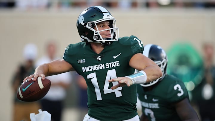 EAST LANSING, MI – AUGUST 31: Brian Lewerke #14 of the Michigan State Spartans throws a first half pass while playing the Utah State Aggies at Spartan Stadium on August 31, 2018 in East Lansing, Michigan. (Photo by Gregory Shamus/Getty Images)