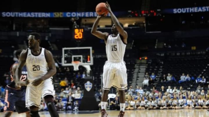 Mar 11, 2015; Nashville, TN, USA; Mississippi State Bulldogs guard I.J. Ready (15) shoots the ball over Auburn Tigers guard K.C. Ross-Miller (12) during the first half of the first round of the SEC Tournament at Bridgestone Arena. Mandatory Credit: Joshua Lindsey-USA TODAY Sports Mar 11, 2015; Nashville, TN, USA; Mississippi State Bulldogs guard I.J. Ready (15) shoots the ball over Auburn Tigers guard K.C. Ross-Miller (12) during the first half of the first round of the SEC Tournament at Bridgestone Arena. Mandatory Credit: Joshua Lindsey-USA TODAY Sports