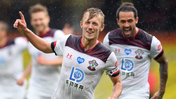 Southampton's English midfielder James Ward-Prowse (C) celebrates scoring the third goal during the English Premier League football match between Watford and Southampton at Vicarage Road Stadium in Watford, north of London on June 28, 2020. (Photo by Justin Setterfield / POOL / AFP) / RESTRICTED TO EDITORIAL USE. No use with unauthorized audio, video, data, fixture lists, club/league logos or 'live' services. Online in-match use limited to 120 images. An additional 40 images may be used in extra time. No video emulation. Social media in-match use limited to 120 images. An additional 40 images may be used in extra time. No use in betting publications, games or single club/league/player publications. / (Photo by JUSTIN SETTERFIELD/POOL/AFP via Getty Images)