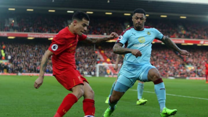 March 12th 2017, Liverpool, Merseyside, England; EPL Premier league football, Liverpool versus Burnley; Andre Gray of Burnley leaps to block the cross of Philippe Coutinho of Liverpool (Photo by David Blunsden/Action Plus via Getty Images)