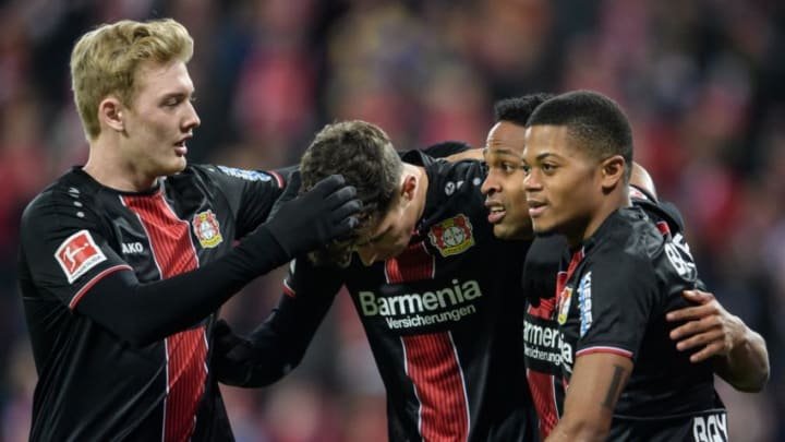 MAINZ, GERMANY - FEBRUARY 08: Nascimento Borges Wendell of Leverkusen celebrates with teammates Julian Brandt, Kai Havertz and Leon Bailey after scoring the opening goal lead during the Bundesliga match between 1. FSV Mainz 05 and Bayer 04 Leverkusen at the Opel Arena on February 08, 2019 in Mainz, Germany. (Photo by Jörg Schüler/Getty Images)