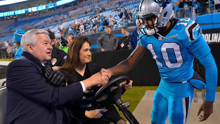 CHARLOTTE, NC - NOVEMBER 17: The Carolina Panthers owner Jerry Richardson shakes hands with Corey Brown