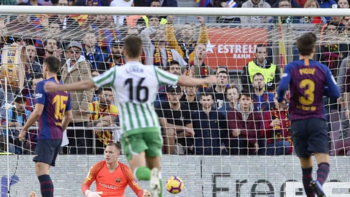 Barcelona's German goalkeeper Marc-Andre Ter Stegen (2L) concedes the opening goal during the Spanish league football match between FC Barcelona and Real Betis at the Camp Nou stadium in Barcelona on November 11, 2018. (Photo by Josep LAGO / AFP) (Photo credit should read JOSEP LAGO/AFP/Getty Images)