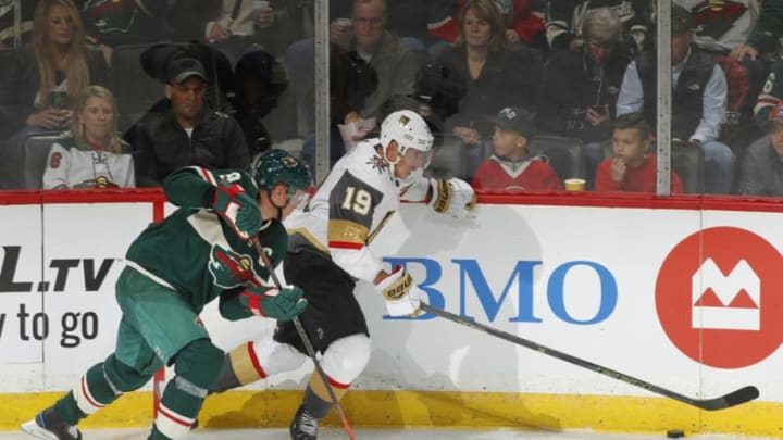 ST. PAUL, MN - OCTOBER 6: Mikko Koivu #9 of the Minnesota Wild and Reilly Smith #19 of the Vegas Golden Knights battle for a puck along the boards during a game between the Minnesota Wild and Las Vegas Golden Knights at Xcel Energy Center on October 6, 2018 in St. Paul, Minnesota. The Golden Knights defeated the Wild 2-1 in a shootout.(Photo by Bruce Kluckhohn/NHLI via Getty Images)