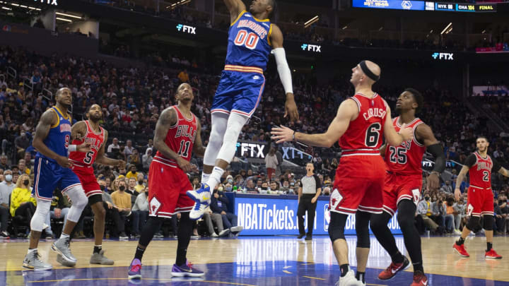 Nov 12, 2021; San Francisco, California, USA; Golden State Warriors forward Jonathan Kuminga (00) soars to the basket with a layup against the Chicago Bulls during the fourth quarter at Chase Center. Mandatory Credit: D. Ross Cameron-USA TODAY Sports