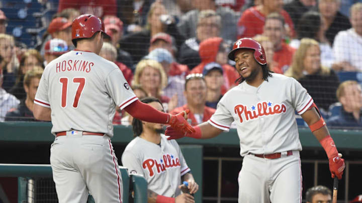 WASHINGTON, DC - SEPTEMBER 09: Rhys Hoskins #17 of the Philadelphia Phillies celebrates hitting a solo home run in the second inning with Odubel Herrera #37 during a baseball game against the Washington Nationals at Nationals Park on September 9, 2017 in Washington, DC. (Photo by Mitchell Layton/Getty Images)