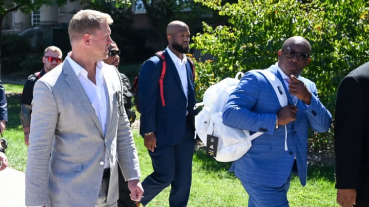 LINCOLN, NE - SEPTEMBER 3: New Interim Head Coach Mickey Joseph (blue suit) walks with former head coach Scott Frost before the game against the North Dakota Fighting Hawks at Memorial Stadium on September 3, 2022 in Lincoln, Nebraska. (Photo by Steven Branscombe/Getty Images)