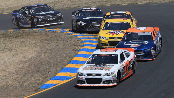 SONOMA, CA – JUNE 23: David Mayhew, driver of the #17 MMI Services/Madoram Chevrolet, leads Ryan Partridge, driver of the #9 Sunrise Ford (Photo by Robert Reiners/Getty Images for NASCAR)