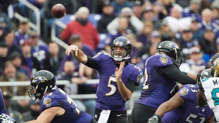 Dec 14, 2014; Baltimore, MD, USA; Baltimore Ravens quarterback Joe Flacco (5) throws during the first quarter against the Jacksonville Jaguars at M&T Bank Stadium. Mandatory Credit: Tommy Gilligan-USA TODAY Sports