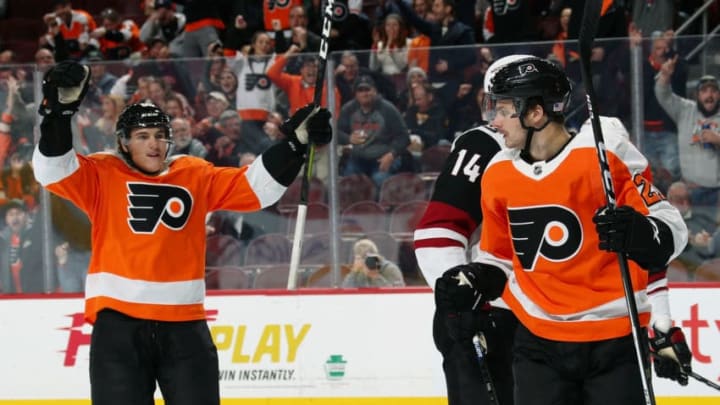 PHILADELPHIA, PA - NOVEMBER 08: Scott Laughton #21 of the Philadelphia Flyers celebrates his first period goal against the Arizona Coyotes with Nicolas Aube-Kubel #62 on November 8, 2018 at the Wells Fargo Center in Philadelphia, Pennsylvania. (Photo by Len Redkoles/NHLI via Getty Images)