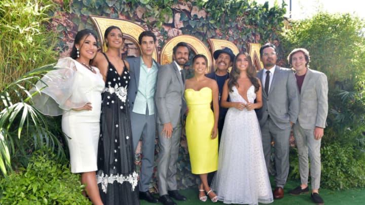 LOS ANGELES, CALIFORNIA - JULY 28: (L-R) Q'orianka Kilcher, Madeleine Madden, Jeff Wahlberg, Eugenio Derbez, Eva Longoria, Danny Trejo, Isabela Moner, Michael Peña, and Nicholas Coombe attend the LA Premiere of Paramount Pictures' "Dora And The Lost City Of Gold" at Regal Cinemas L.A. Live on July 28, 2019 in Los Angeles, California. (Photo by Emma McIntyre/Getty Images)