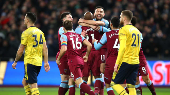 LONDON, ENGLAND - DECEMBER 09: Angelo Ogbonna of West Ham United celebrates with Robert Snodgrass and team mates after he scores his sides first goal during the Premier League match between West Ham United and Arsenal FC at London Stadium on December 09, 2019 in London, United Kingdom. (Photo by Julian Finney/Getty Images)