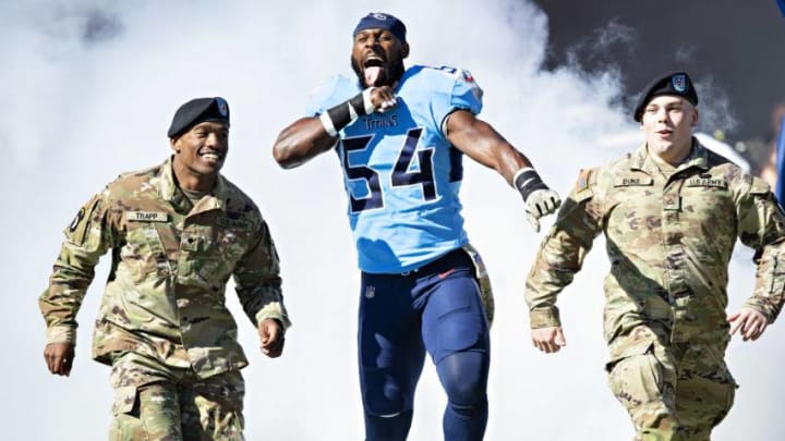NASHVILLE, TN - NOVEMBER 10: Rashaan Evans #54 of the Tennessee Titans runs onto the field with soldiers before a game against the Kansas City Chiefs at Nissan Stadium on November 10, 2019 in Nashville, Tennessee. The Titans defeated the Chiefs 35-32. (Photo by Wesley Hitt/Getty Images)