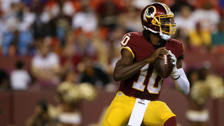 LANDOVER, MD – AUGUST 20: Quarterback Robert Griffin III #10 of the Washington Football Team looks to make a pass during a preseason game against the Detroit Lions at FedEx Field on August 20, 2015 in Landover, Maryland. (Photo by Matt Hazlett/Getty Images)