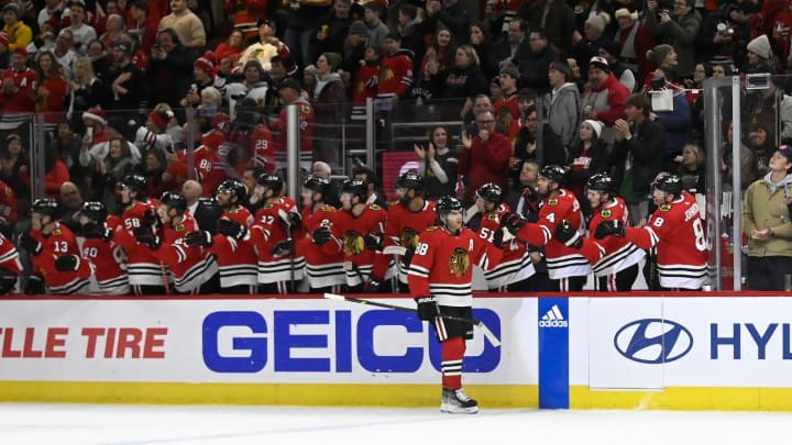 Dec 23, 2022; Chicago, Illinois, USA; Chicago Blackhawks right wing Patrick Kane (88) celebrates with teammates after he scored a goal against the Columbus Blue Jackets during the first period at the United Center. Mandatory Credit: Matt Marton-USA TODAY Sports