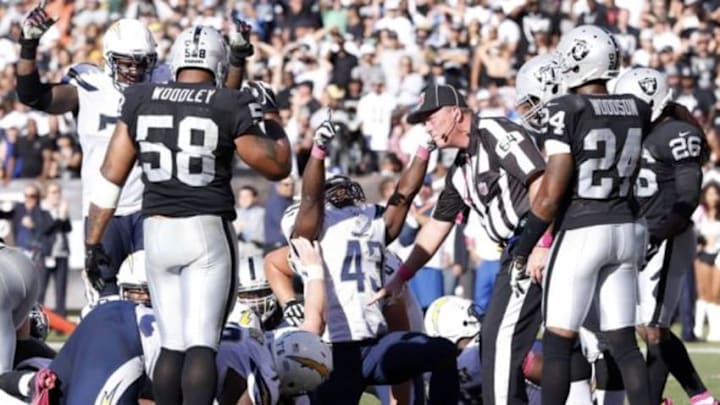 Oct 12, 2014; Oakland, CA, USA; San Diego Chargers running back Branden Oliver (43) scores the final touchdown of the game against the Oakland Raiders during the fourth quarter at O.co Coliseum. Chargers won 31-28. Mandatory Credit: Bob Stanton-USA TODAY Sports