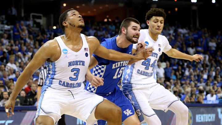 Mar 26, 2017; Memphis, TN, USA; North Carolina Tar Heels forward Kennedy Meeks (3) and forward Justin Jackson (44)) box out against Kentucky Wildcats forward Isaac Humphries (15) in the first half during the finals of the South Regional of the 2017 NCAA Tournament at FedExForum. Mandatory Credit: Nelson Chenault-USA TODAY Sports