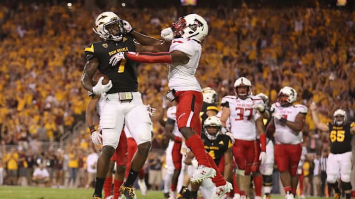 TEMPE, AZ - SEPTEMBER 10: Running back Kalen Ballage #7 of the Arizona State Sun Devils scores a one yard touchdown rush against defensive back Jah'Shawn Johnson #7 of the Texas Tech Red Raiders during the first half of the college football game at Sun Devil Stadium on September 10, 2015 in Tempe, Arizona. (Photo by Christian Petersen/Getty Images)