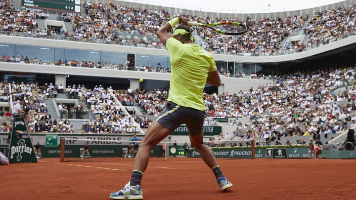 PARIS, FRANCE – JUNE 09: Rafael Nadal of Spain returns the ball in the men’s singles final against Dominic Thiem of Austria during Day fifteen of the 2019 French Open at Roland Garros on June 09, 2019 in Paris, France. ( (Photo by Quality Sport Images/Getty Images)