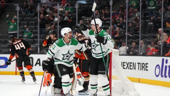Mar 29, 2022; Anaheim, California, USA; Dallas Stars center Radek Faksa (12) and center Luke Glendening (11) celebrate after a goal against the Anaheim Ducks in the first period at Honda Center. Mandatory Credit: Kirby Lee-USA TODAY Sports