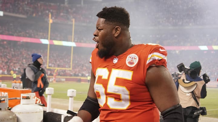 Jan 23, 2022; Kansas City, Missouri, USA; Kansas City Chiefs guard Trey Smith (65) celebrates while leaving the field after the win over the Buffalo Bills during an AFC Divisional playoff football game at GEHA Field at Arrowhead Stadium. Mandatory Credit: Denny Medley-USA TODAY Sports