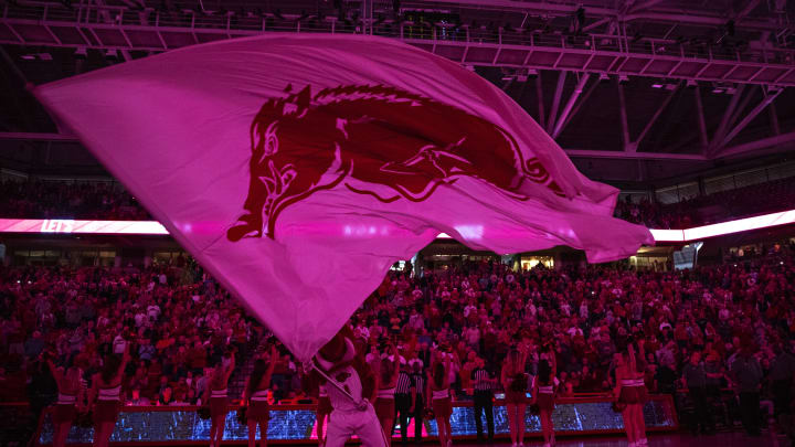 FAYETTEVILLE, AR – FEBRUARY 22: Razorback Flag is waved before a game between the Arkansas Razorbacks (Photo by Wesley Hitt/Getty Images)