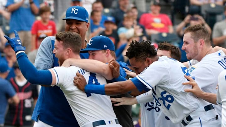 KANSAS CITY, MISSOURI - SEPTEMBER 29: Brett Phillips #14 of the Kansas City Royals celebrates his game-winning sacrifice fly with teammates in the ninth inning against the Minnesota Twins at Kauffman Stadium on September 29, 2019 in Kansas City, Missouri. The Royals won 5-4. (Photo by Ed Zurga/Getty Images)