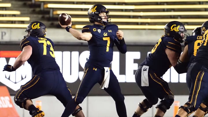 Dec 5, 2020; Berkeley, California, USA; California Golden Bears quarterback Chase Garbers (7) throws the ball against the Oregon Ducks during the third quarter at California Memorial Stadium. Mandatory Credit: Kelley L Cox-USA TODAY Sports