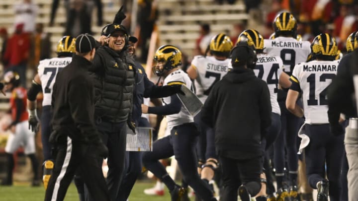 Nov 20, 2021; College Park, Maryland, USA; Michigan Wolverines head coach Jim Harbaugh reacts after wide receiver A.J. Henning ( not pictured) returned a kickoff for a touchdown during the second half against the Maryland Terrapins at Capital One Field at Maryland Stadium. Mandatory Credit: Tommy Gilligan-USA TODAY Sports