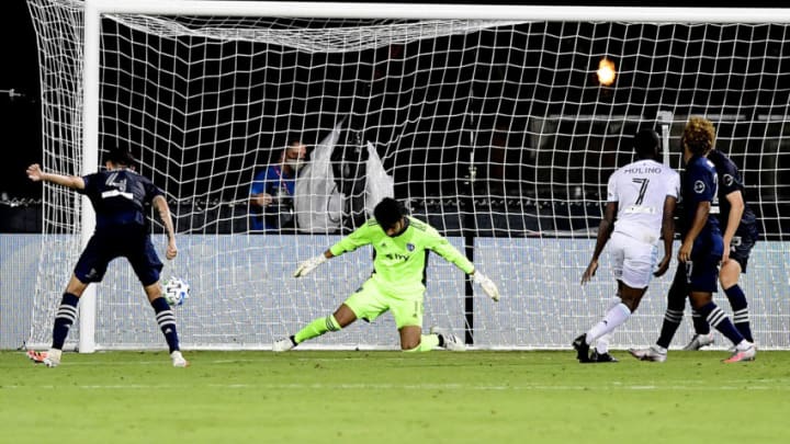 REUNION, FLORIDA - JULY 12: Kevin Molino #7 of Minnesota United scores the game-winning goal during the second half against Sporting Kansas City in the MLS Is Back Tournament at ESPN Wide World of Sports Complex on July 12, 2020 in Reunion, Florida. Minnesota United won 2-1. (Photo by Emilee Chinn/Getty Images)