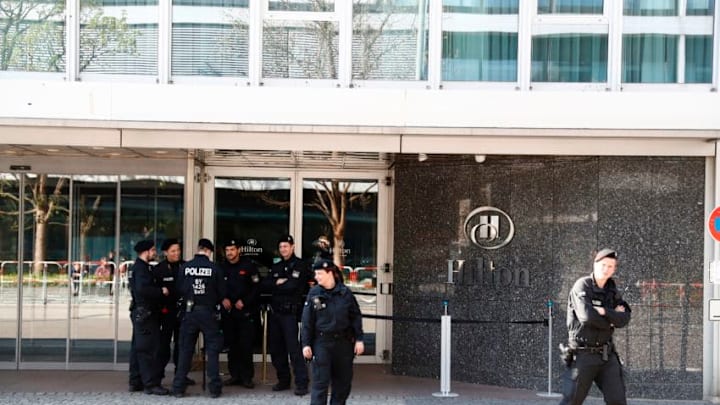Policemen stand in front of the team hotel of Real Madrid on April 12, 2017 in Munich, southern Germany, prior to the UEFA Champions League quarter-final, first-leg football match of Bayern Munich vs Real Madrid.Security was ratcheted up in Munich, one day after three explosions rocked the team bus of German football club Borussia Dortmund minutes after the bus set off to a planned Champions League game against Monaco on Tuesday night (April 11, 2017). / AFP PHOTO / Odd ANDERSEN (Photo credit should read ODD ANDERSEN/AFP/Getty Images)