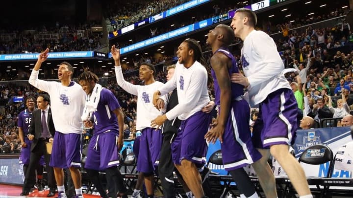 Mar 18, 2016; Brooklyn, NY, USA; Stephen F. Austin Lumberjacks players celebrate on the bench against the West Virginia Mountaineers in the second half in the first round of the 2016 NCAA Tournament at Barclays Center. Mandatory Credit: Anthony Gruppuso-USA TODAY Sports