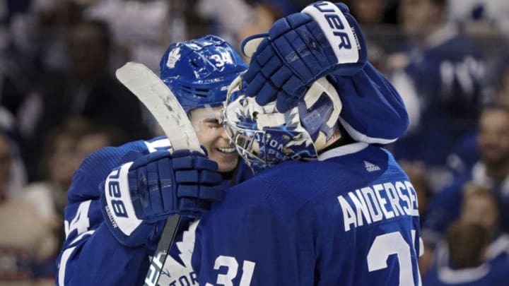 TORONTO, ON - APRIL 07: Toronto Maple Leafs Center Auston Matthews (34) congratulates teammate Goalie Frederik Andersen (31) as the team celebrates its 4-2 win after the final NHL 2018 regular-season game between the Montreal Canadiens and the Toronto Maple Leafs on April 7, 2018 at Air Canada Centre in Toronto, ON., Canada. (Photo by Jeff Chevrier/Icon Sportswire via Getty Images)